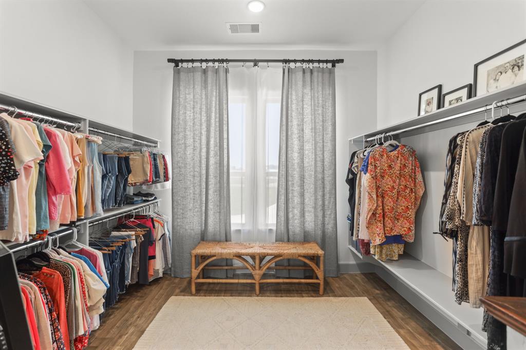 One of two large walk-in closets. This one has natural sunlight