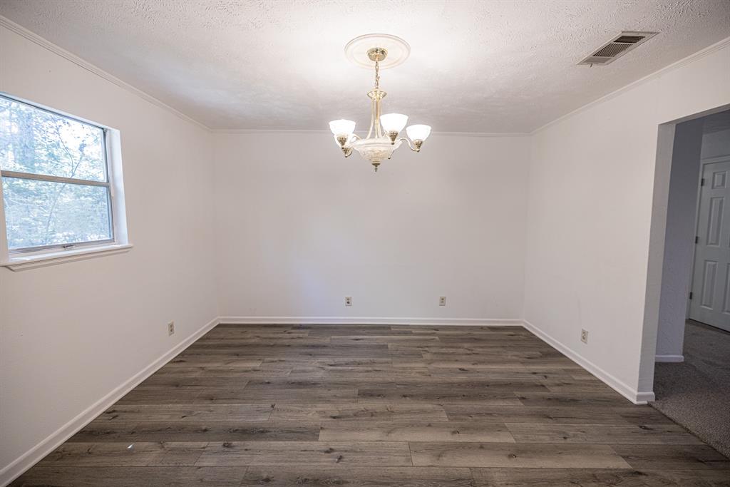 DINING RM/ FLEX SPACE  LUX VINYL FLOORS !