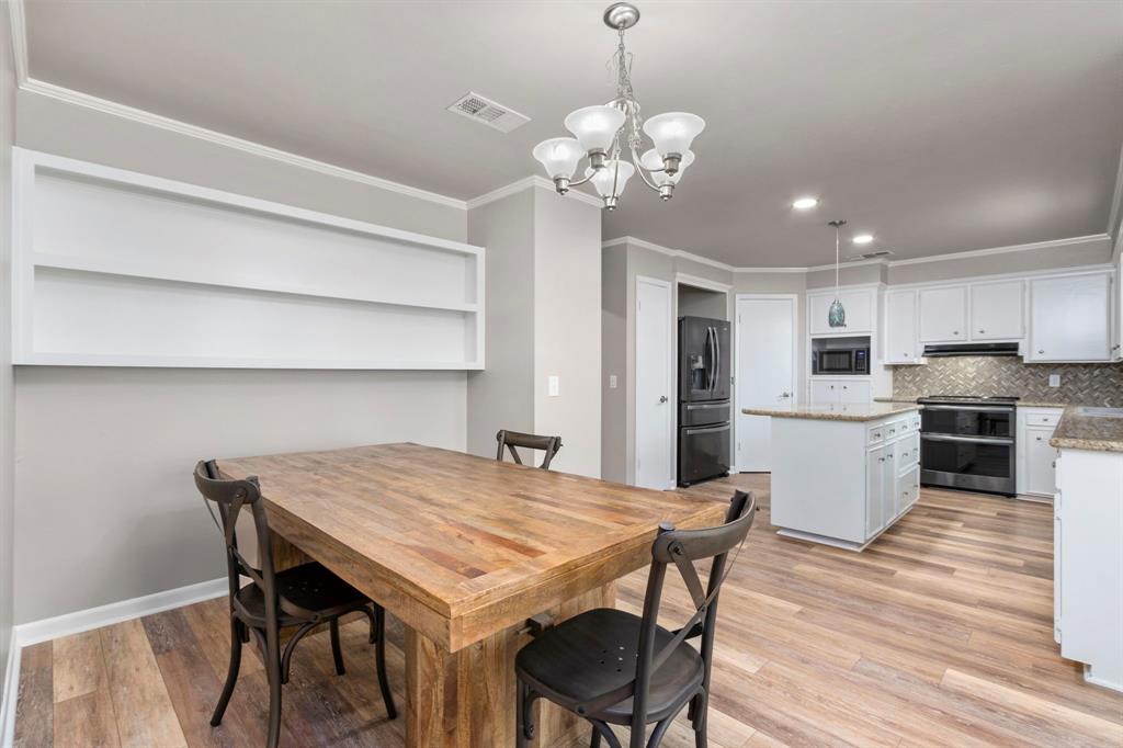 The breakfast area is perfect for those informal meals when the large dining room is not needed.