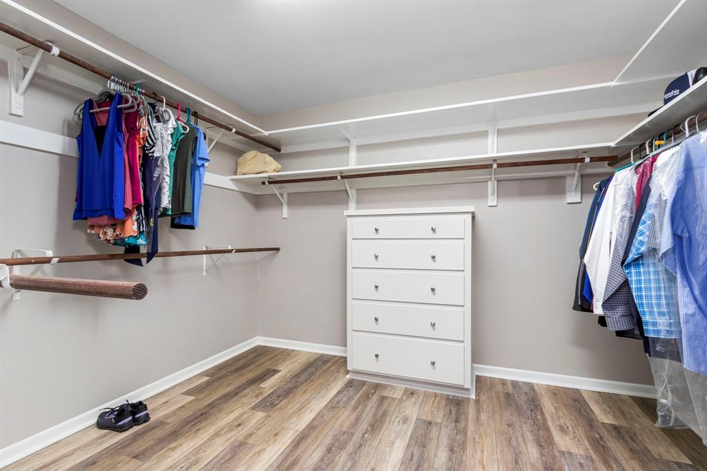 Expansive walk in closet will accommodate all your wardrobe needs.