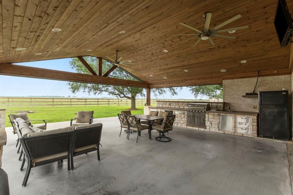 Ample room for multiple seating areas. Imagine hosting game nights in this amazing extended outdoor living space. Your  home will be the gathering place of family and friends.