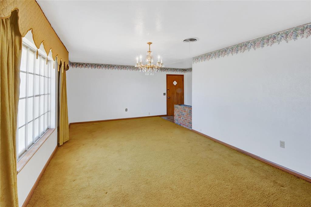 Lots of natural light makes this a great room for entertaining or a really nice home office.