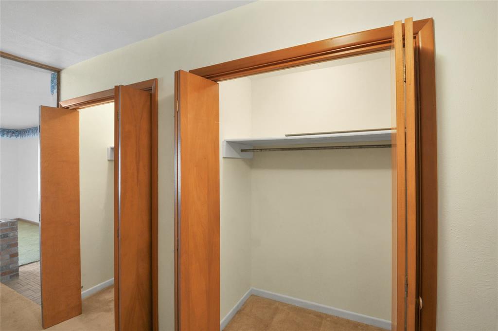 Generous storage closets in entry halway.