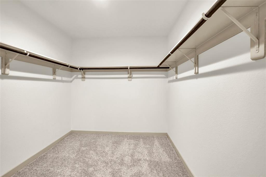 Look at this HUGE Primary Closet.