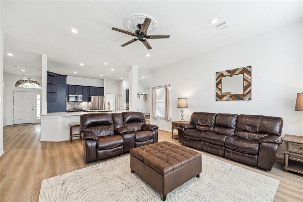 Open concept living room to kitchen.