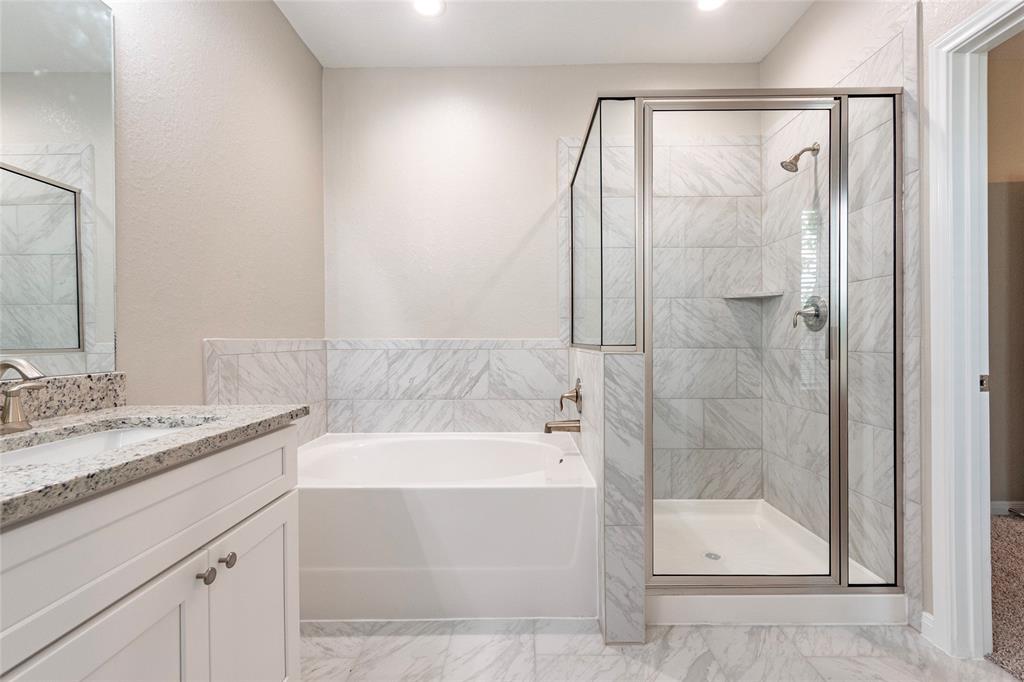 Primary bath with soaking tub and shower