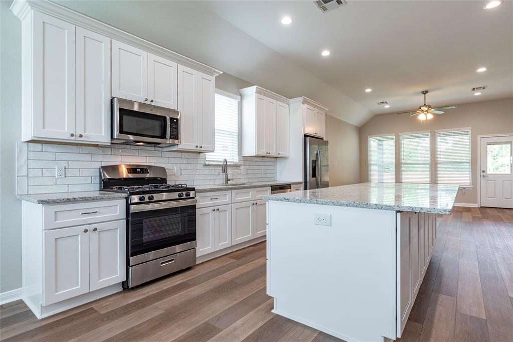 Elegantt white cabinets with 42\