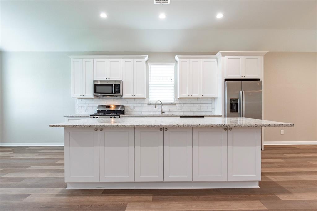 Large kitchen island with storage on both sides