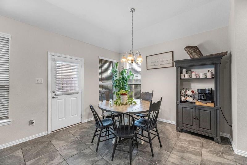 Breakfast room, door on left leads to covered patio.