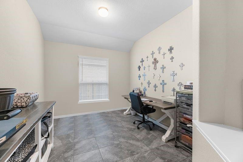 Flex Room - can be your home office, media, craft room or playroom!  Tile floors here too!