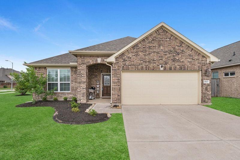 Charming exterior, covered porch, brick all 4 sides!