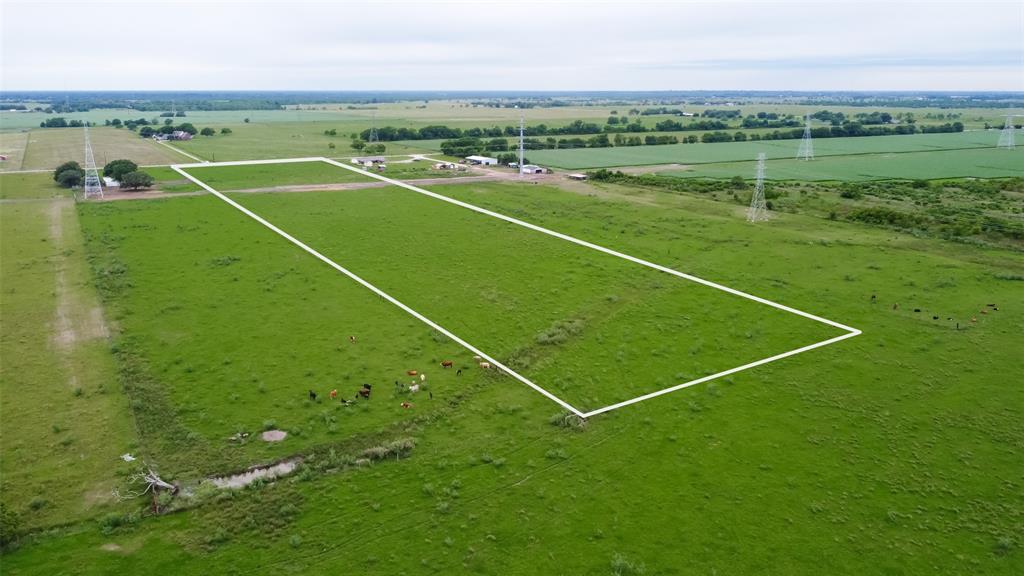 Aerial view from the back of the property line.   Utility lines replaced an NO utility poles located on the property.