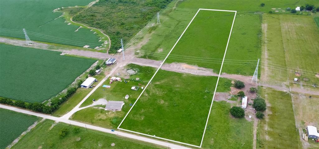 The utilities were just replaced with new lines.  There is normally not a break in the grass line on this 13.5 acres.   This was the road path for the workers to get through.