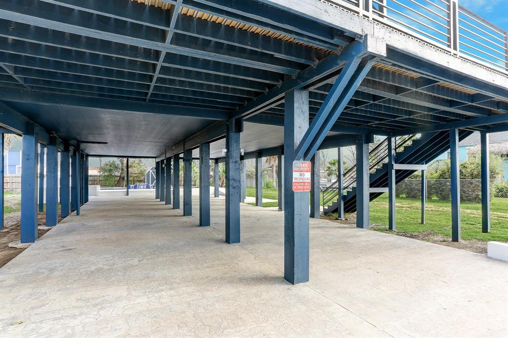 THE ELEVATED GROUND LEVEL IS IDEAL FOR PARKING 6 VEHICLES OR BOAT STORAGE.