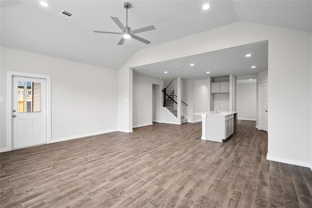 Another view from the Family Room into kitchen and view of the stairs.