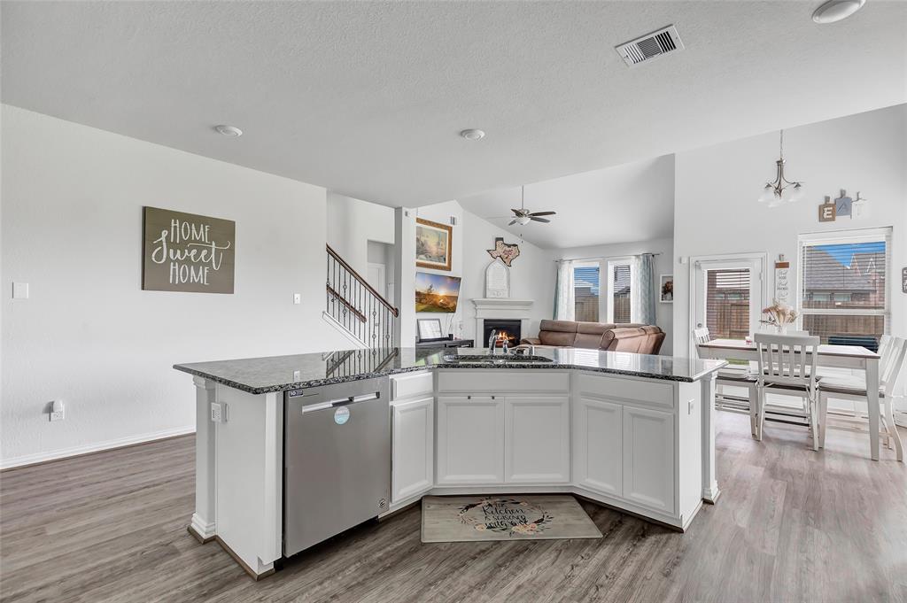 Large kitchen island overlooking family room