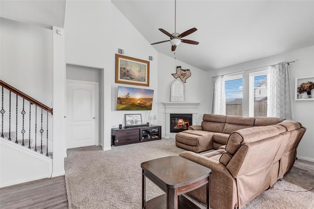 Rod Iron stairwell and spacious family room