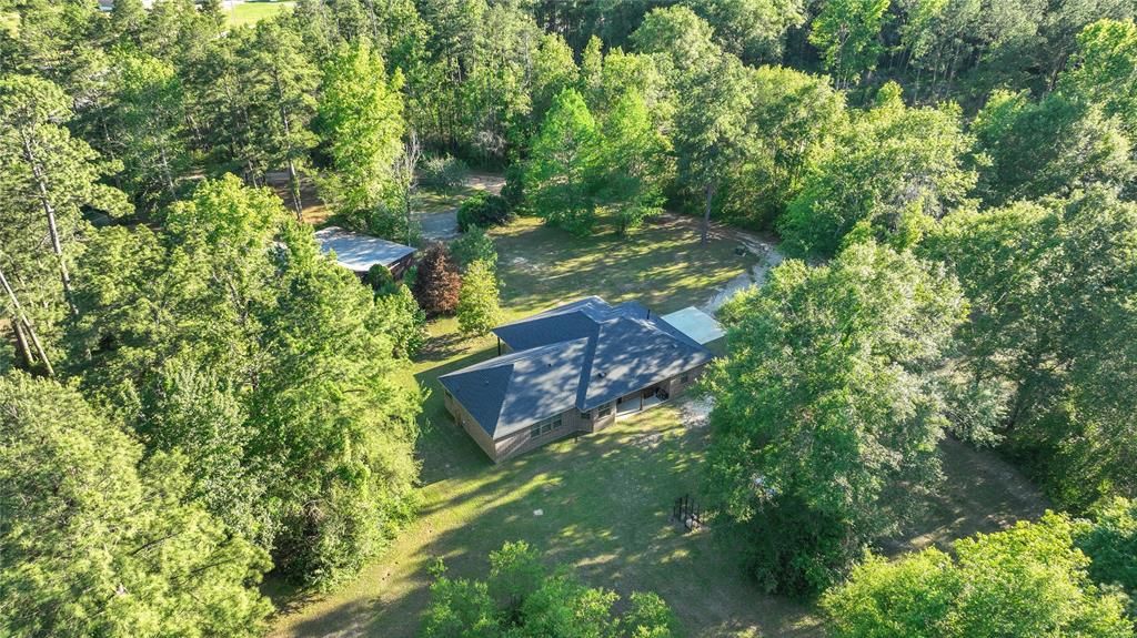 This beautiful one story home is nestled on 5 acres