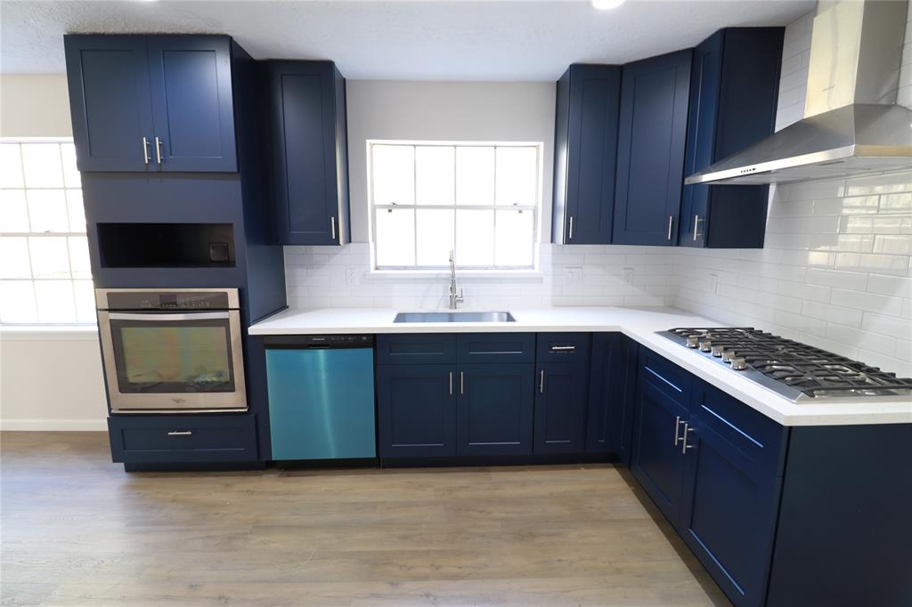 Gutted and redone kitchen with brand new stainless steel appliances.