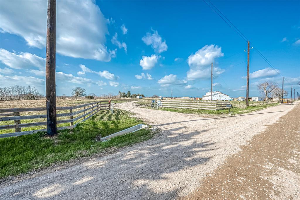 Come enjoy this 10.1 Acre Land that allows Horses, Cattle and Mobile Homes. 
Improvements and features include; Aerobic Septic Tank and Water Well installed in 2023. Also, the owner started to build a home on the property and will remain as part of the sale. It has a fenced interior with 5-strand barbed wire, a metal gate with a wooden entrance, and no restrictions. The property is about 45 Miles from Downtown Houston and just about 10 minutes from Needville. The property is NOT in the flood zone.