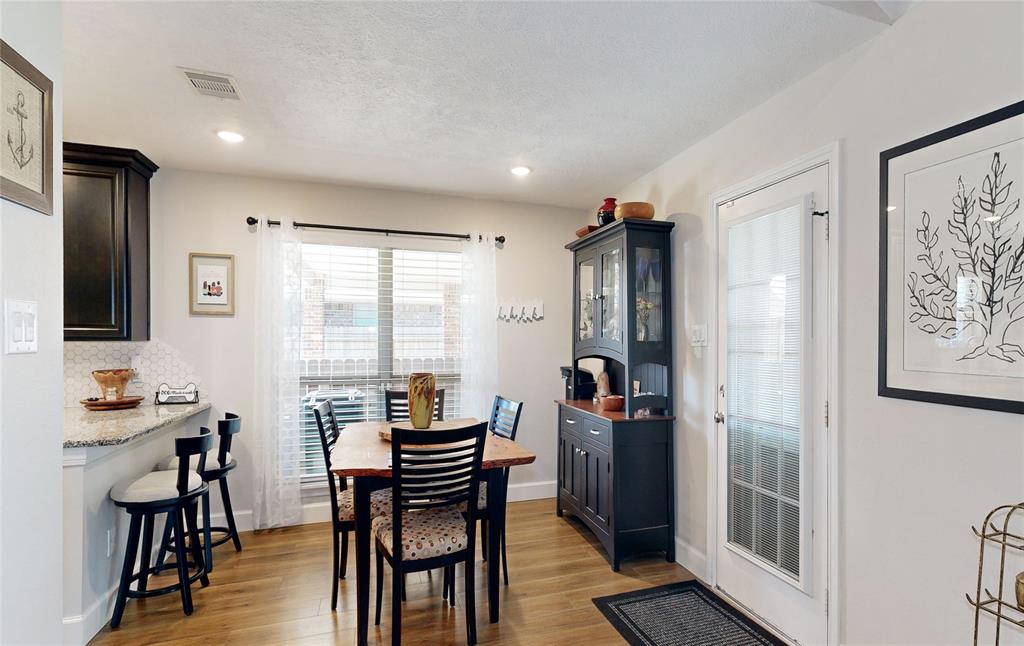 Another view of the Breakfast Area. A great feature in this kitchen is that it has two bar areas for extra seating and gathering around the kitchen.