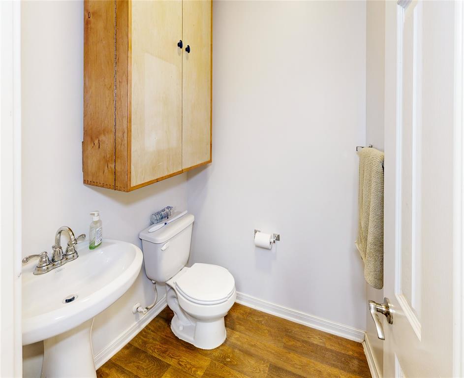 1/2 Bath in Downstairs Garage area.