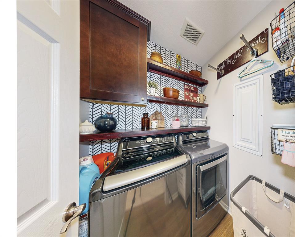 This laundry room is so pretty you may not hate doing laundry.