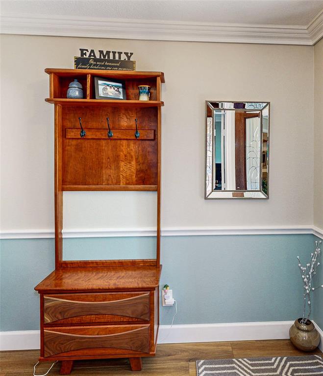 Gorgeous custom Cherry Wood built-in coat stand. What a perfect way to keep the front entry organized.