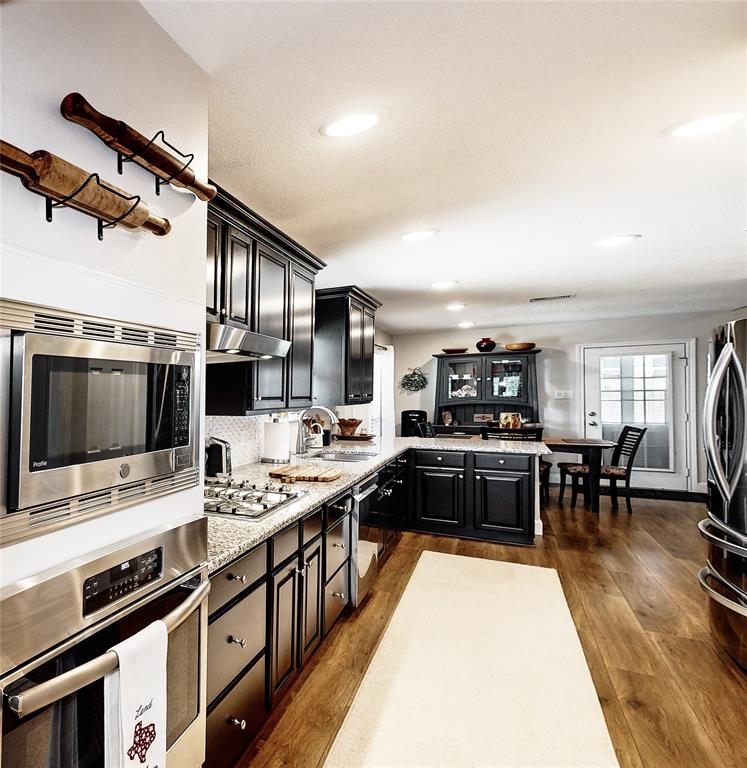 Another view of the Kitchen. There is an abundance of cabinet and drawer space for all of your cooking utensils.