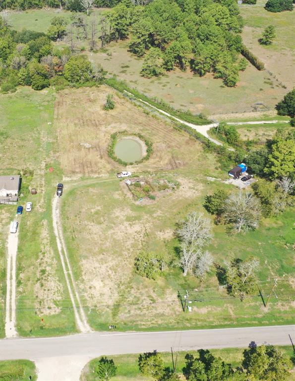 Country living at its best.  This property will be approximately 2.17 acres after it is subdivided.  Has a pond that a family of ducks calls home.  Right off of CR 171.  City water is available.  In Zone X this would be a perfect little property build your country home.