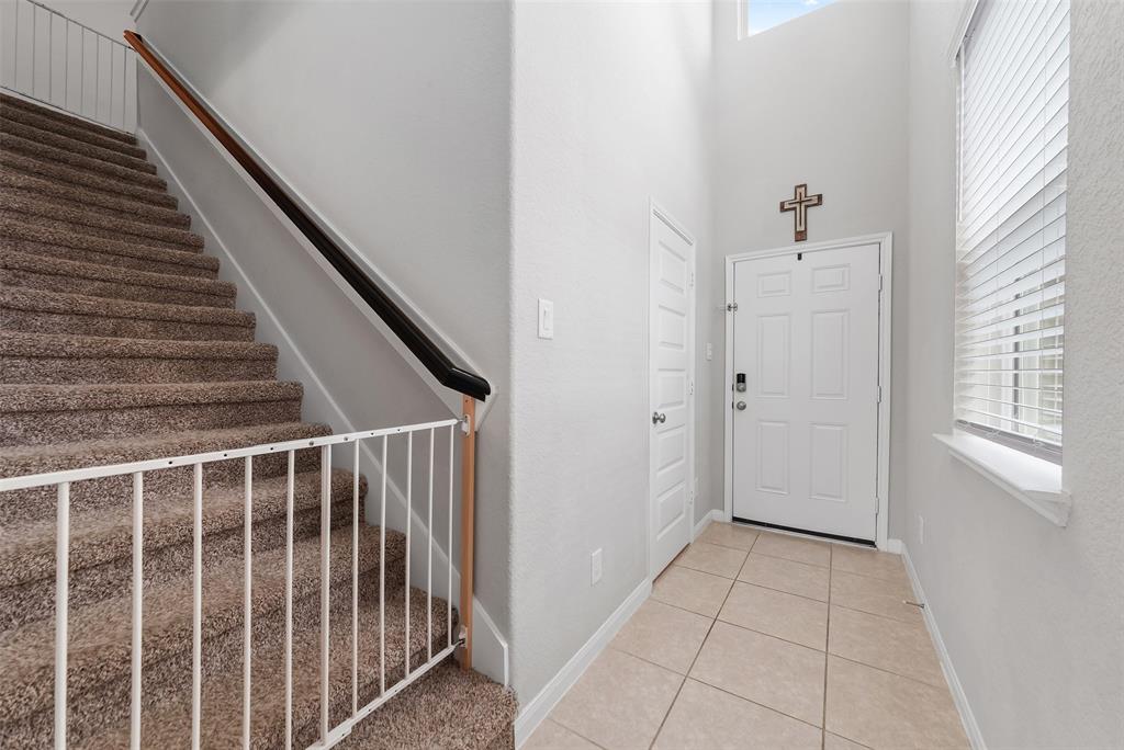 Entry way with half bath.