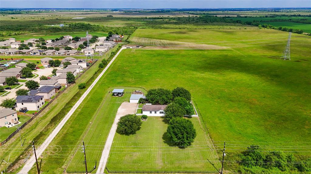 Excellent commercial opportunity available with 10 unrestricted acres in the heart of a rapidly growing area! Ideal location for further development be it retail space, industrial facilities, or a mixed-use development, the potential is great. This property has the advantage of a location that's part of a thriving community with increasing economic activity. Property has approximaely 498 ft of road frontage on Warren Ranch Rd. A manufactured home on the property provides immediate functionality as an office space, offering convenience during the planning and development stages. 8 miles from 290 & Grand Parkway.