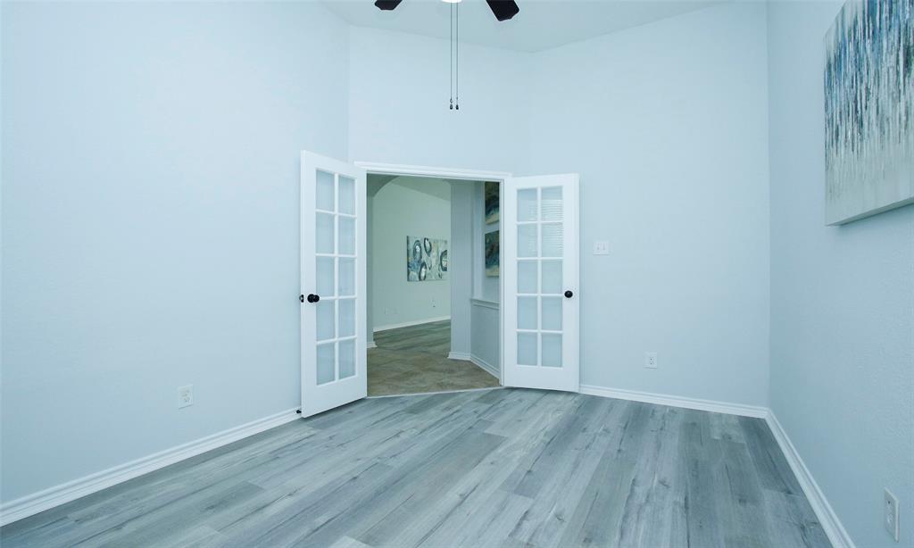 Step inside and there is the home office or study with French doors for privacy. Fresh paint throughout your home.