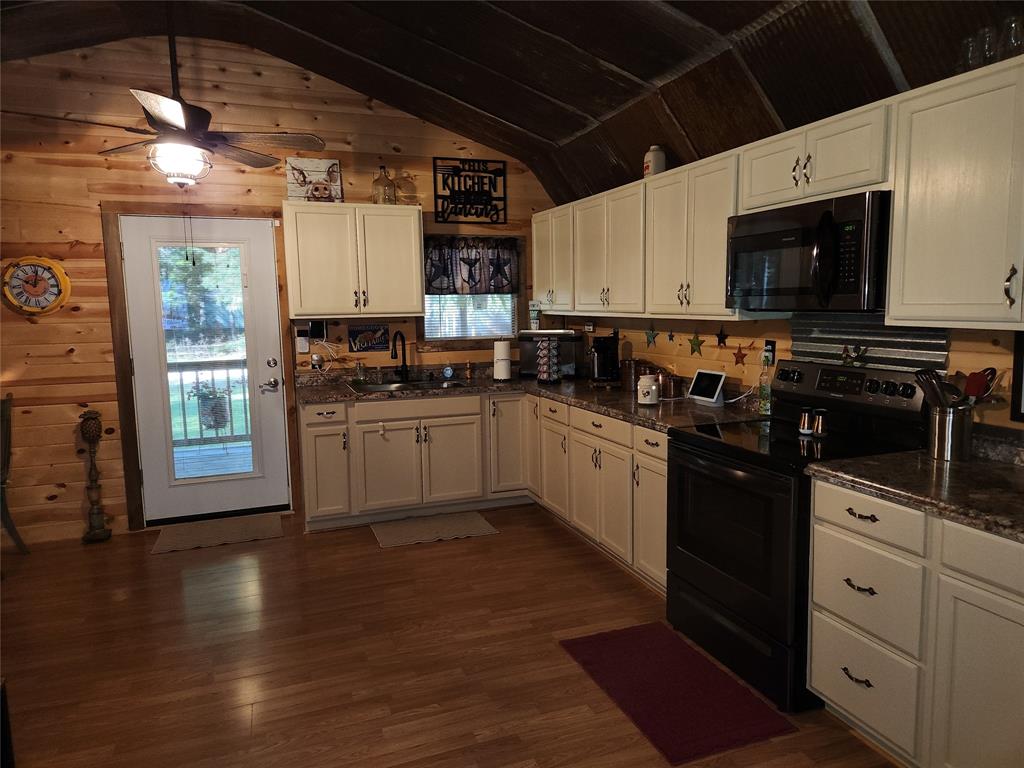 Kitchen has lots of storage including above cabinet decorating space