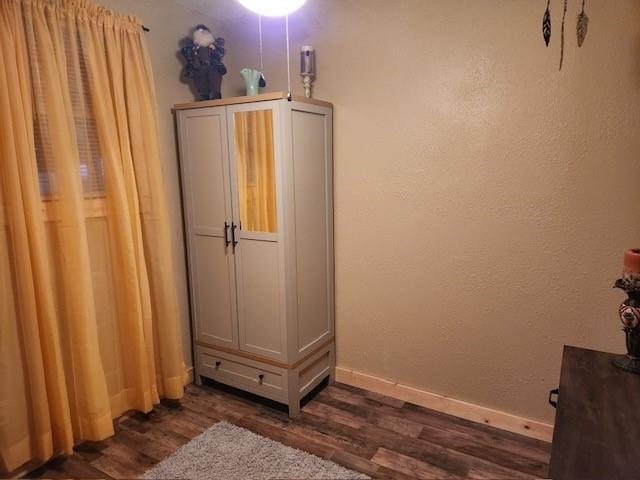 Back door to side porch and carport. Stackable washer and dryer  can stay.