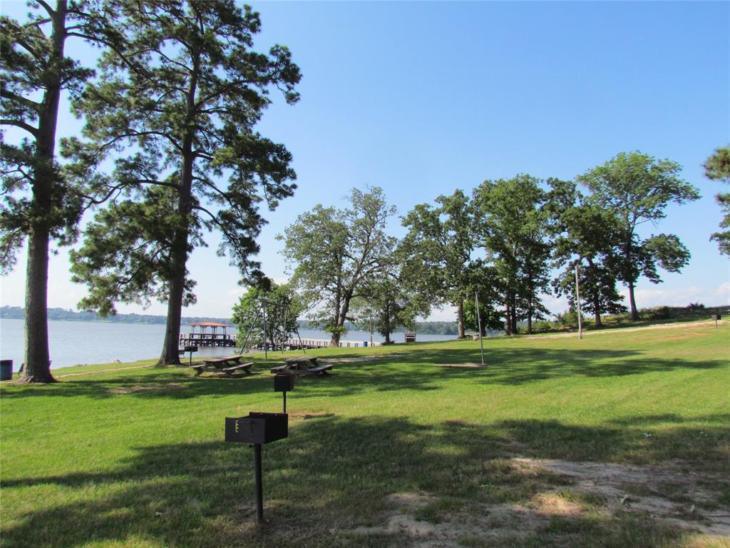 Clubhouse with large back porch with lake view.