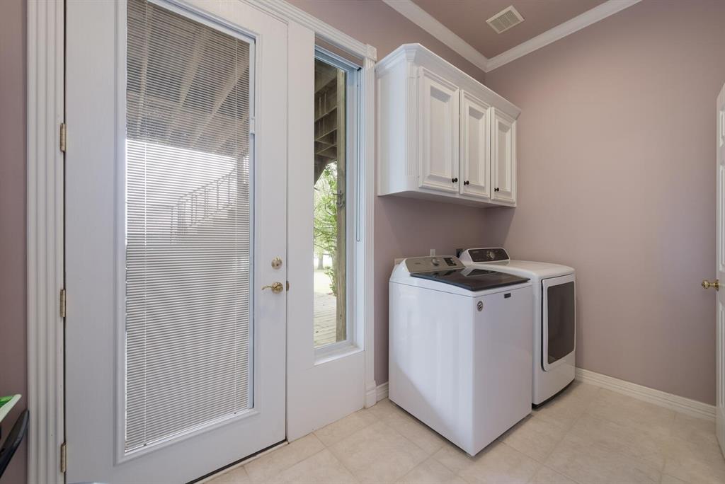 Laundry room with attached half bath