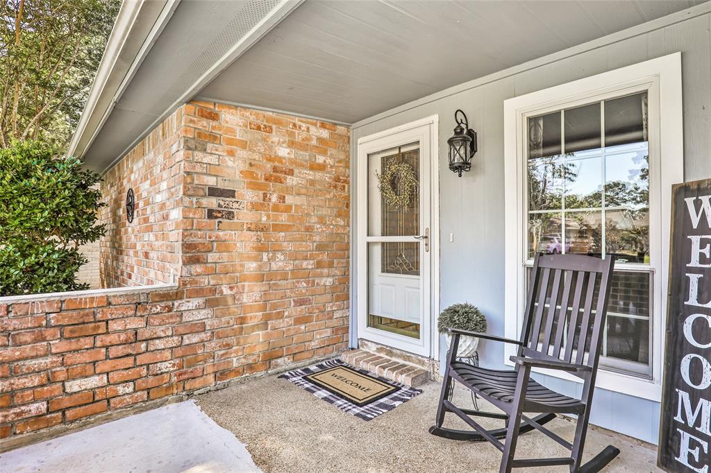 Front porch with low wall to conceal delivered packages