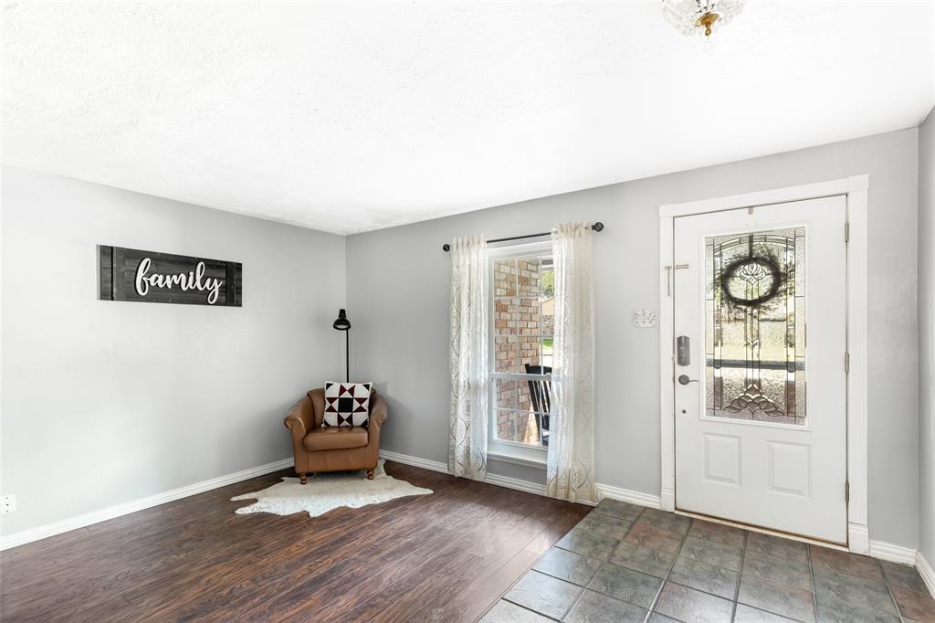 Front entryway with sitting room