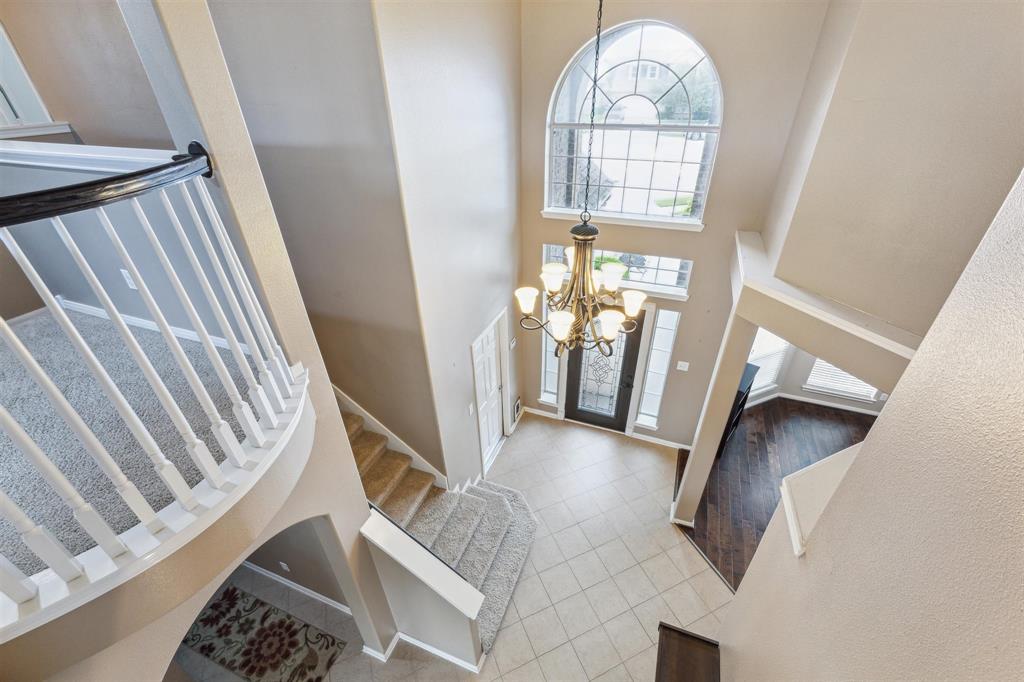 View from Game Room upstairs to foyer downstairs