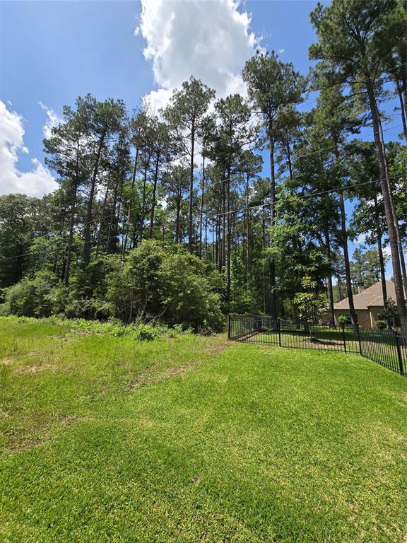 View of property and neighbors fence.