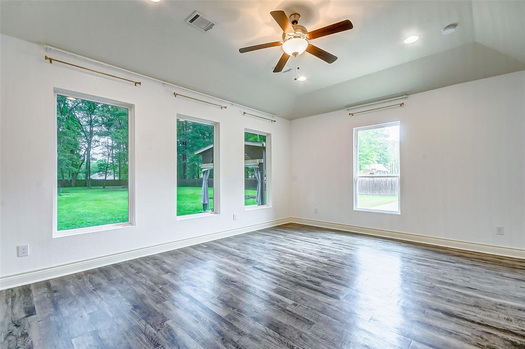 Primary room with your gorgeous view of the vast back yard