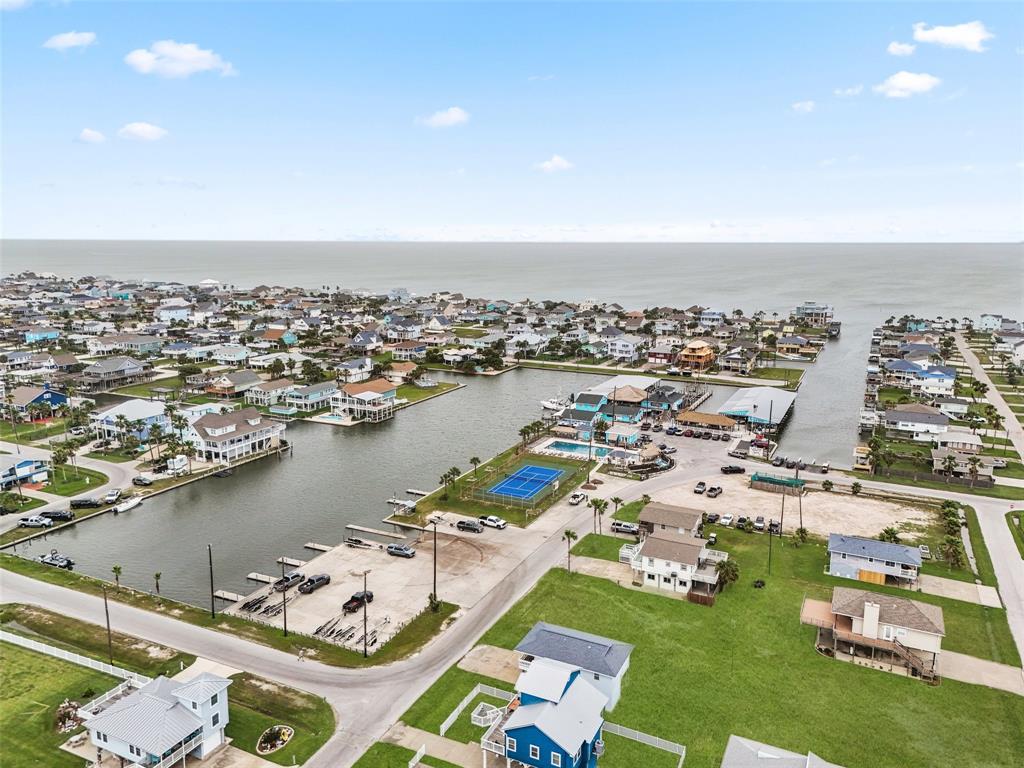 Sea Isle community pool, tennis courts, marina, & restaurant.