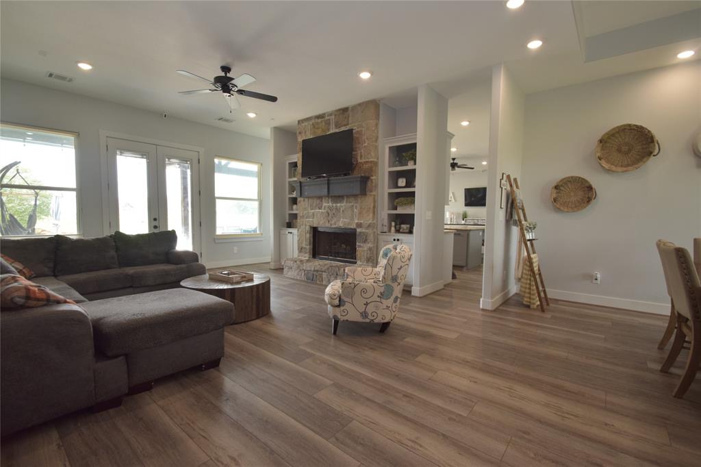 FRONT ENTRY WITH RAISED CUSTOM CEILING.