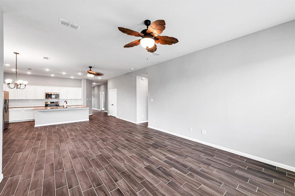 The living room is huge and seamlessly open to the dining room and kitchen, creating a great space for entertaining.