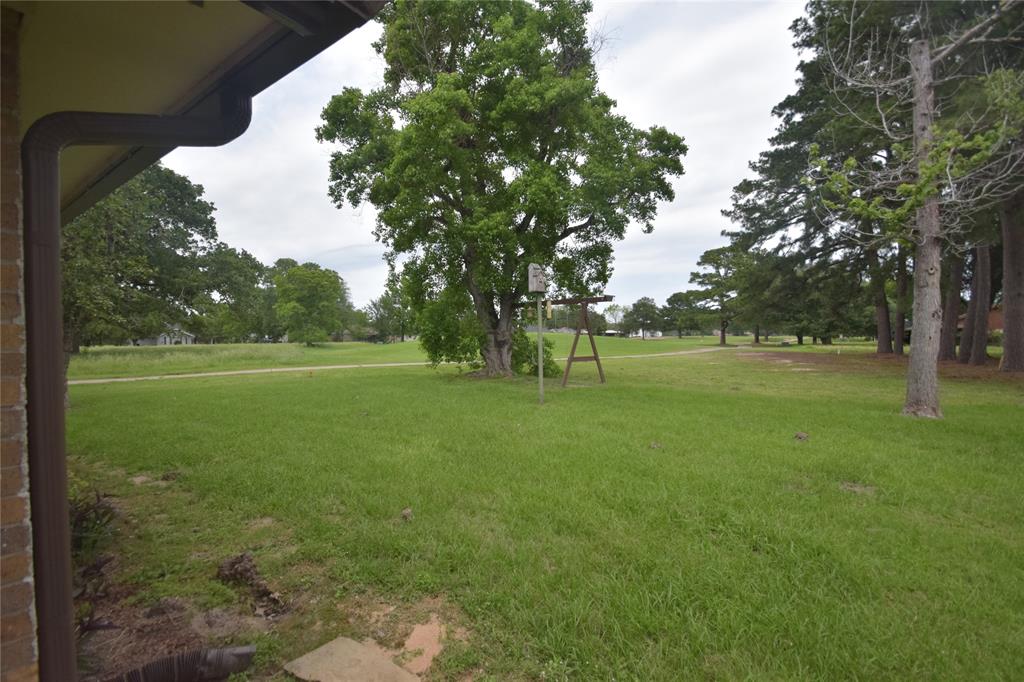 View of the back yard from the back covered patio