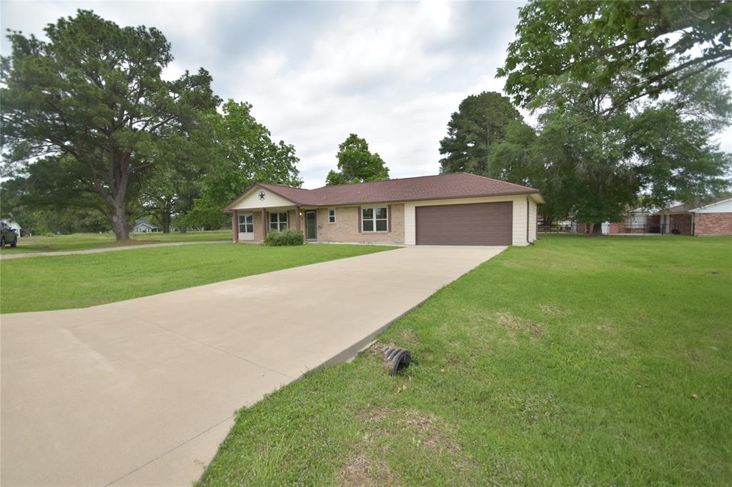 LOCATION, LOCATION, LOCATION...HUGE YARD ON THE GOLF COURSE AND DOWN THE STREET FROM THE COUNTRY CLUB.