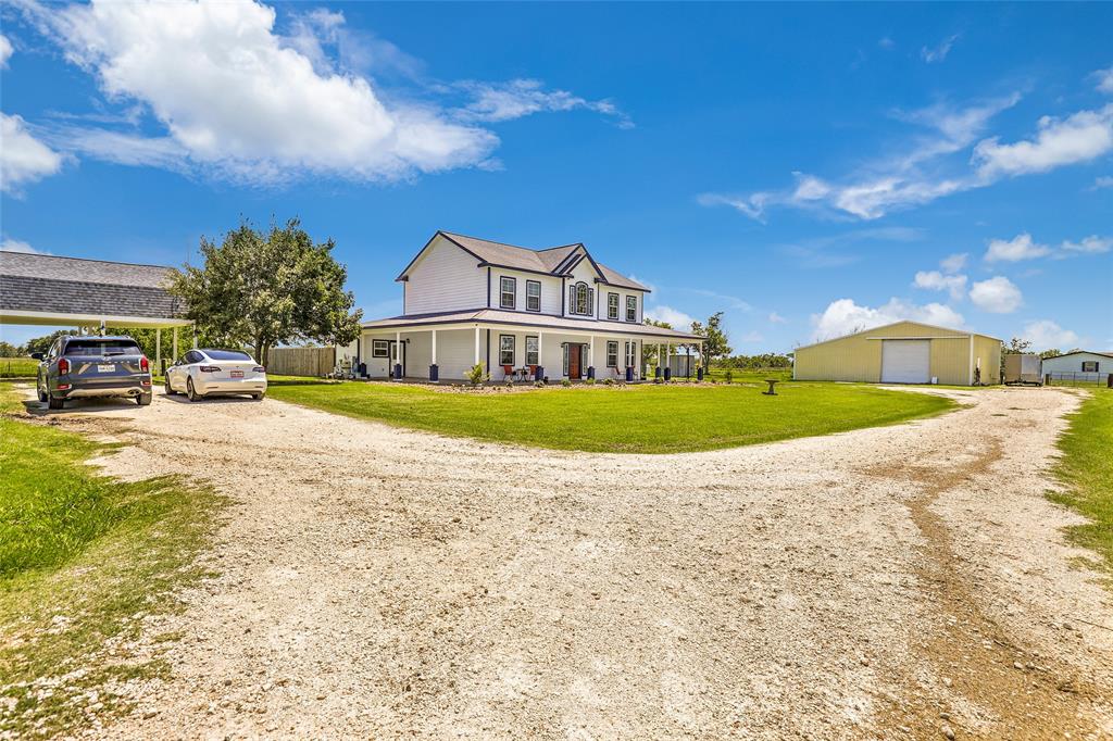 Driveway to shop and Carport