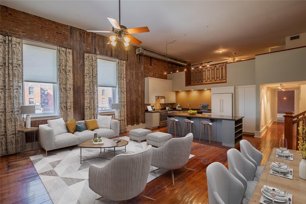 The sleek kitchen has expansive drawers and lots of storage with a pantry