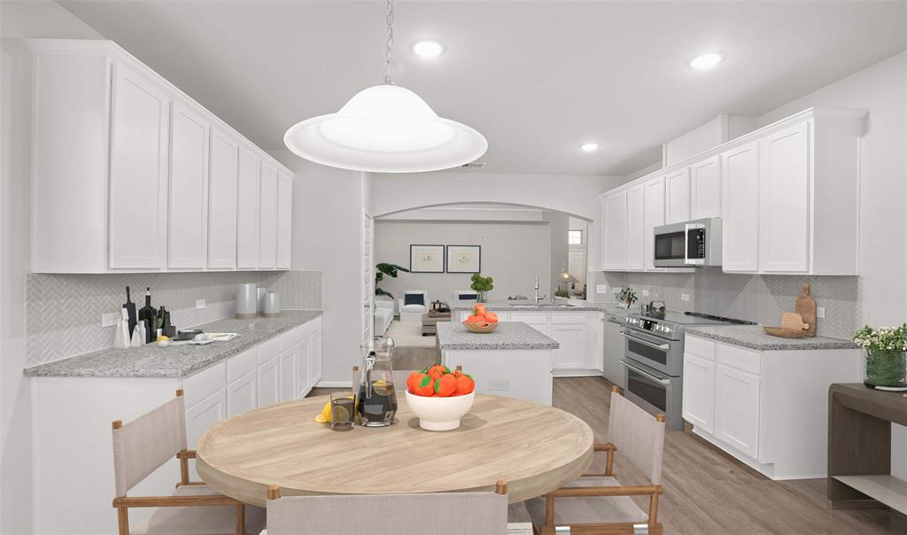 Kitchen with island (*Photo not of actual home and used for illustration purposes only.)